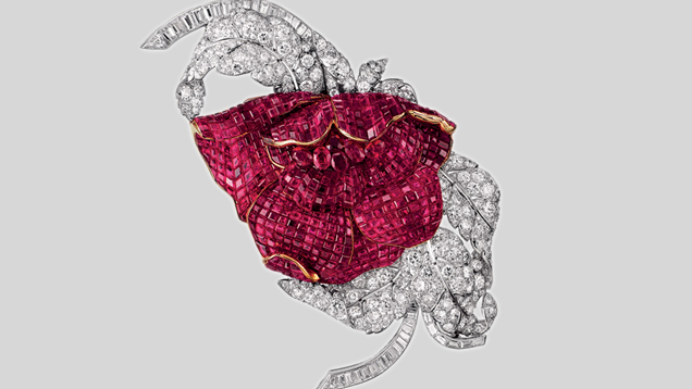 This Peony clip has petals composed of 700 Mystery-set square Burmese rubies, a heart made of six oval faceted rubies, and foliage made of 43 baguette and 196 round diamonds. The rubies weigh 60 ct total, the diamonds 30 ct. Photo courtesy of Van Cleef & Arpels.