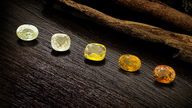 Figure 1. These exceptional natural yellow sapphires from Madagascar (2.1–2.6 ct) represent both the Fe3+ chromophore and the trapped hole paired with Fe3+. Photo by Ronnakorn Manorotkul/Lotus Gemology; courtesy of GemFever.