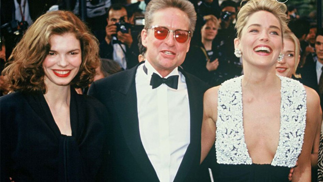Jeanne Tripplehorn, Michael Douglas, Sharon Stone on the Red Carpet at the premier of Basic Instinct in 1992. © Martin Katz, Ltd. Jeanne Tripplehorn, Michael Douglas, Sharon Stone on the Red Carpet at the premier of Basic Instinct in 1992. © Martin Katz, Ltd.