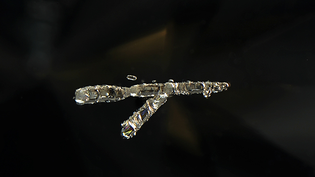 Small crystal next to cluster. Small crystal next to cluster.